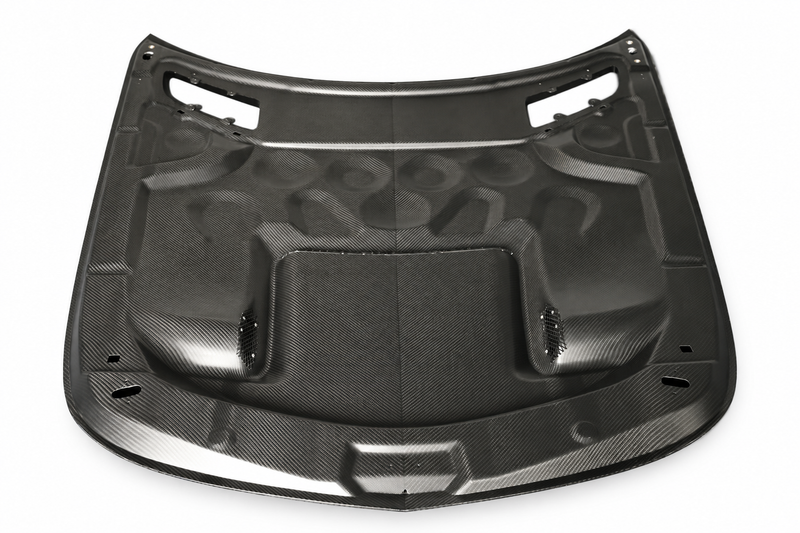 Underside of Black Series-style dry carbon bonnet for Mercedes-AMG GT C190 on a white studio background