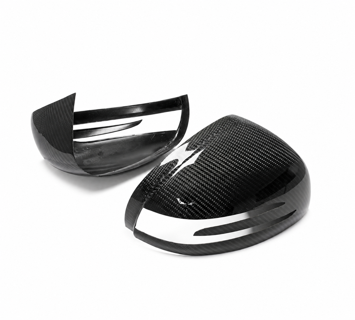 Gloss carbon fibre mirror covers for Mercedes-AMG GT C190 showing inner and outer surfaces on a white studio background