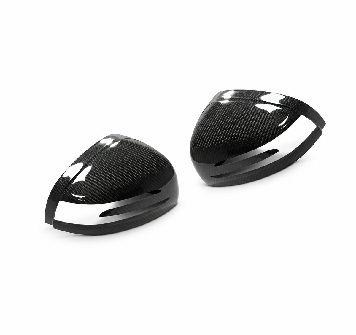 Pair of gloss carbon fibre mirror covers for Mercedes-AMG GT and GT S C190 on a white studio background