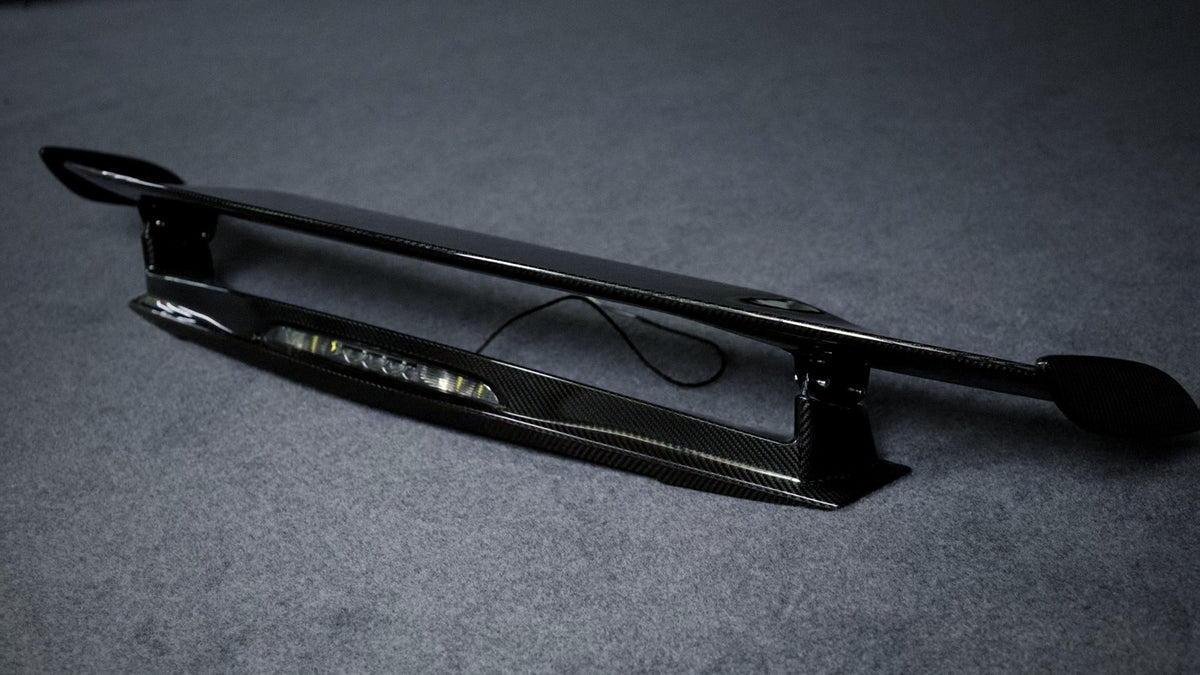 GT-R style carbon fibre rear wing for Mercedes-AMG GT C190, angled front view