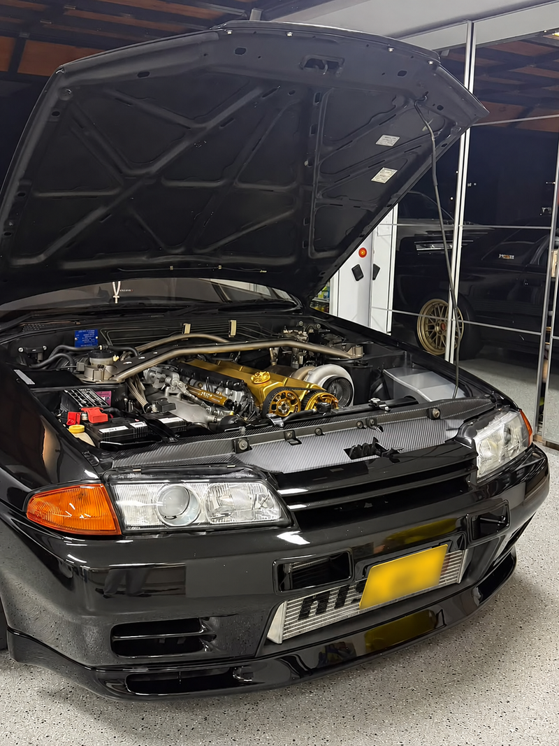 Customer Nissan Skyline R32 GT-R with Carbonetics dry carbon cooling panel fitted, number plate blurred