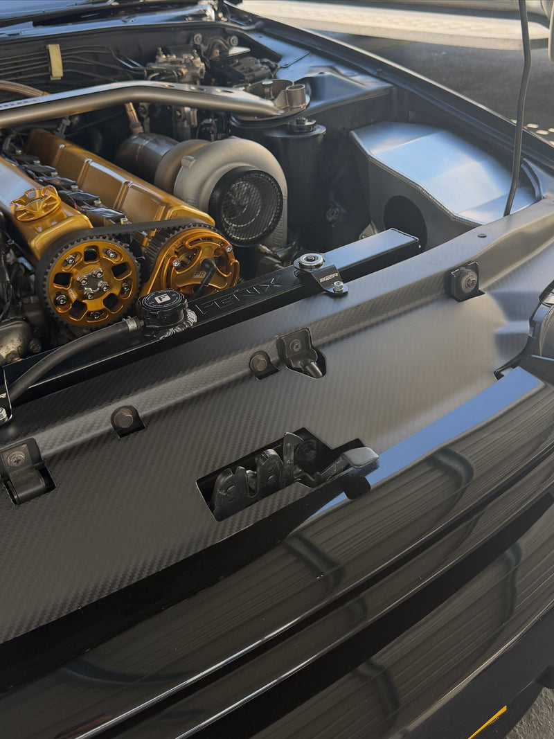 Close-up of Carbonetics dry carbon cooling panel and carbon weave fitted to a customer Nissan Skyline R32 GT-R